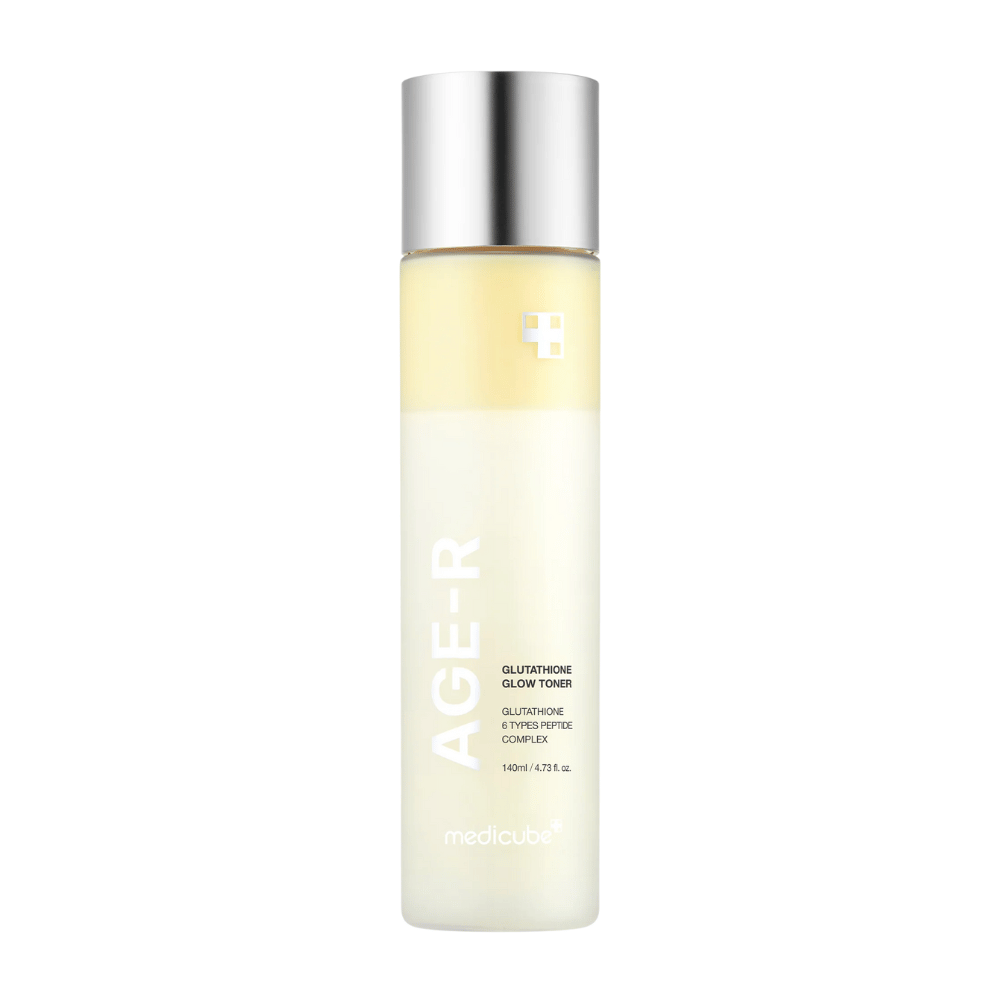 Flacone di Medicube Age-R Glutathione Glow Toner, un tonico viso giallo chiaro contenente glutatione e un complesso peptidico. Il prodotto è progettato per dare alla pelle una luminosità duratura e un tono uniforme. La bottiglia ha un design elegante e minimalista con un tappo color argento.