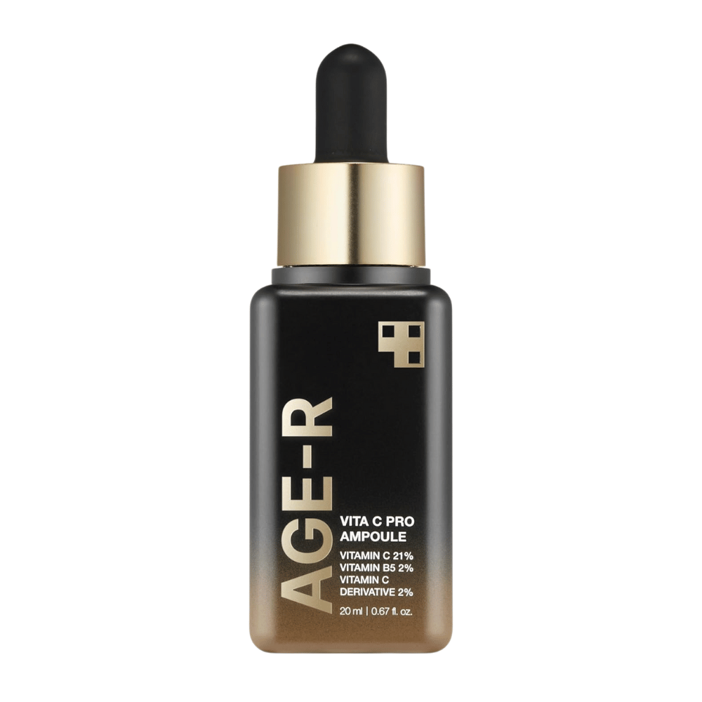 Bottiglia di Medicube Age-R Vita C Pro Ampoule, un prodotto che contiene il 21% di vitamina C, il 2% di vitamina B5 e il 2% di derivato della vitamina C. La confezione nera e dorata ha un contagocce per un'applicazione precisa. Il prodotto è progettato per illuminare e migliorare la texture della pelle.