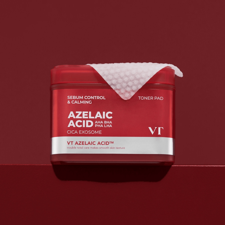 VT Azelaic Acid Tonico viso Pad – barattolo rosso con pad testurizzato, perfetto per uniformare il tono della pelle e ridurre le impurità.