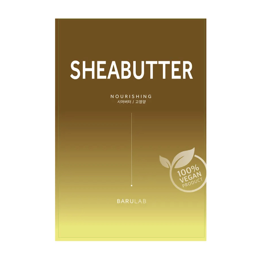 Una confezione di maschera "SHEABUTTER Nourishing" BARULAB, etichettata come "100% Vegan Product". La confezione ha un gradiente di colore che va dal marrone dorato scuro in alto al giallo chiaro in basso.