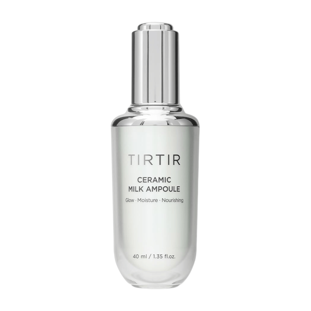 Una bottiglia trasparente TIRTIR Ceramic Milk Ampoule, etichettata con "Glow - Moisture - Nourishing", su uno sfondo bianco.