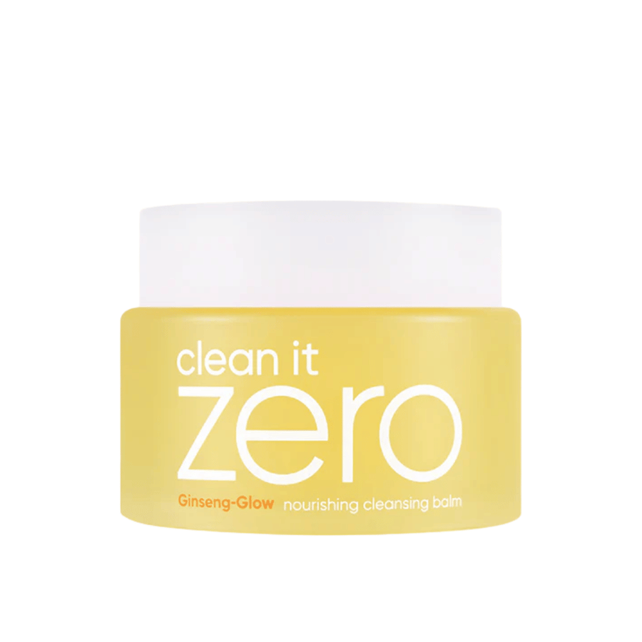 Clean It Zero Ginseng-Glow Nourishing Cleansing Balm in barattolo giallo su sfondo bianco, un balsamo struccante idratante di BANILA CO che rimuove efficacemente trucco e impurità.