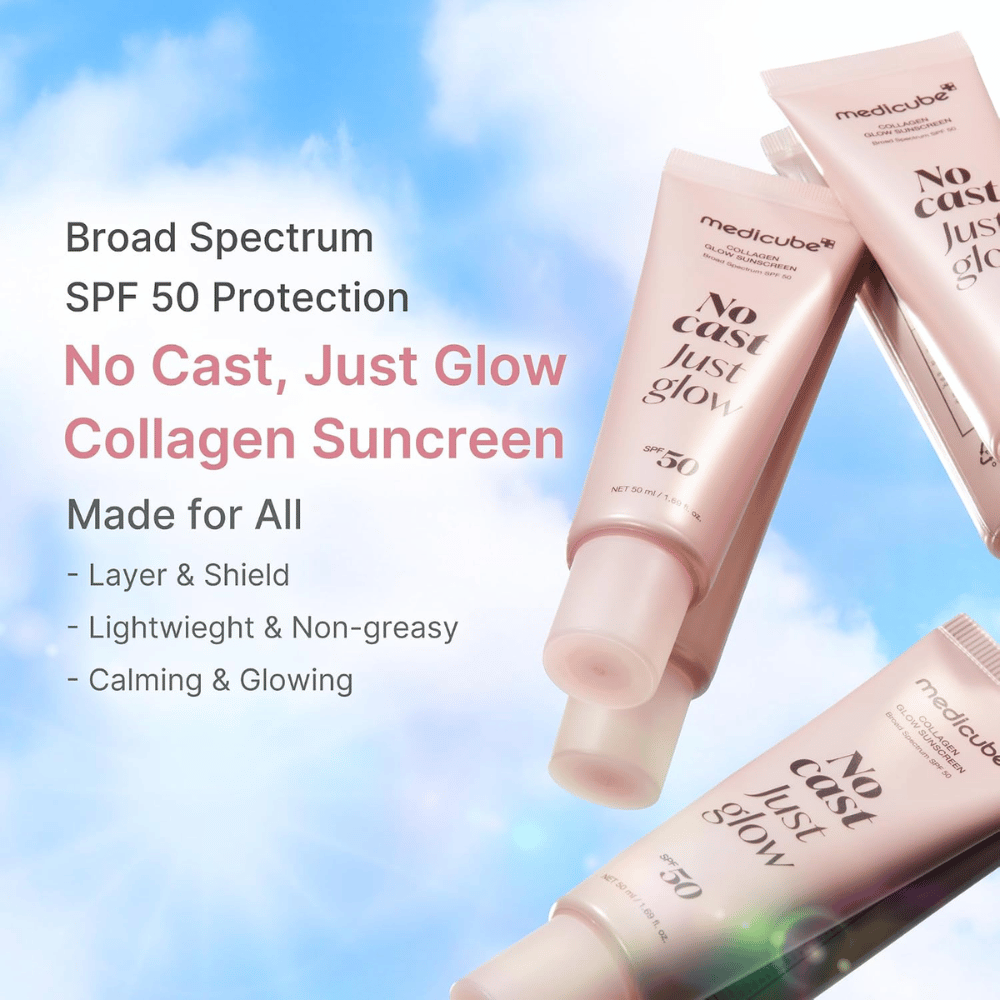 Medicube Collagen Glow Sunscreen SPF 50, protezione solare leggera con effetto glow senza patina bianca. Tubetti rosa di protezione solare contro un cielo azzurro.