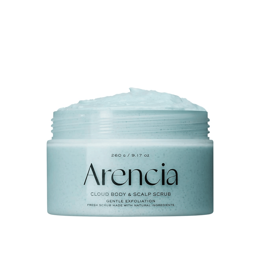 Arencia Fresh Cloud Scrub French Mint & Lily su sfondo bianco. Scrub per il corpo e per il cuoio capelluto rinfrescante che esfolia delicatamente e dona una sensazione di pelle fresca e morbida.