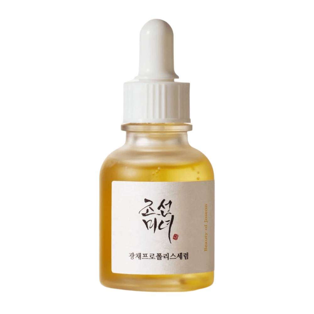 Flacone di Beauty of Joseon Glow Serum con pipetta bianca e siero dorato, un prodotto illuminante con propoli e niacinamide.