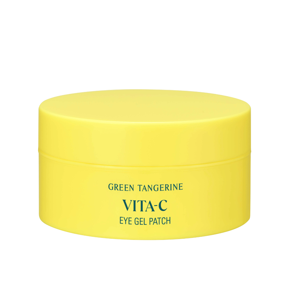 Un barattolo giallo etichettato "GREEN TANGERINE VITA-C EYE GEL PATCH" probabilmente maschere per gli occhi che contengono vitamina C.