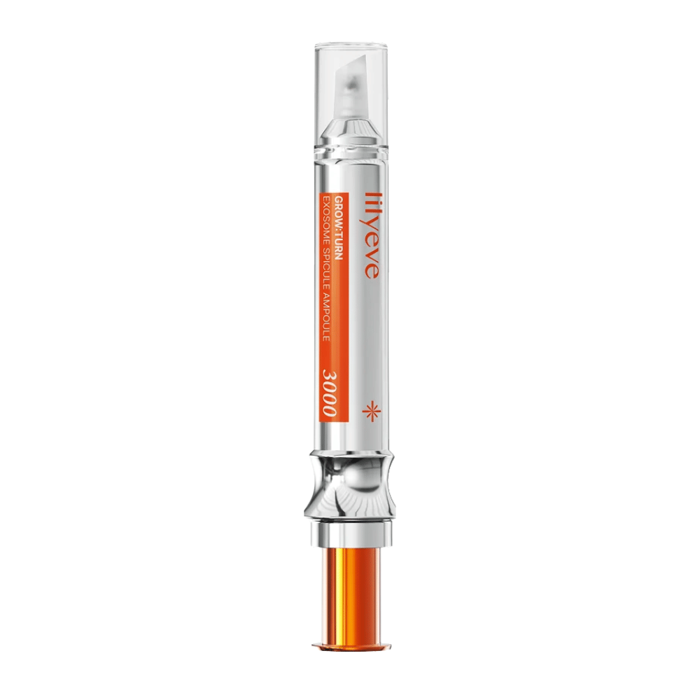 LILYEVE Grow Turn Exosome Spicule Ampoule 3000 – fiala per il cuoio capelluto con applicatore di precisione in confezione argentata e arancione.