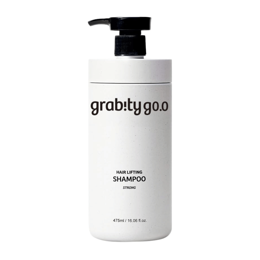 Grabity g0.0 Hair Lifting Shampoo Strong in un elegante flacone dosatore bianco su sfondo bianco, sviluppato per donare volume, forza e un aspetto dei capelli più pieno.