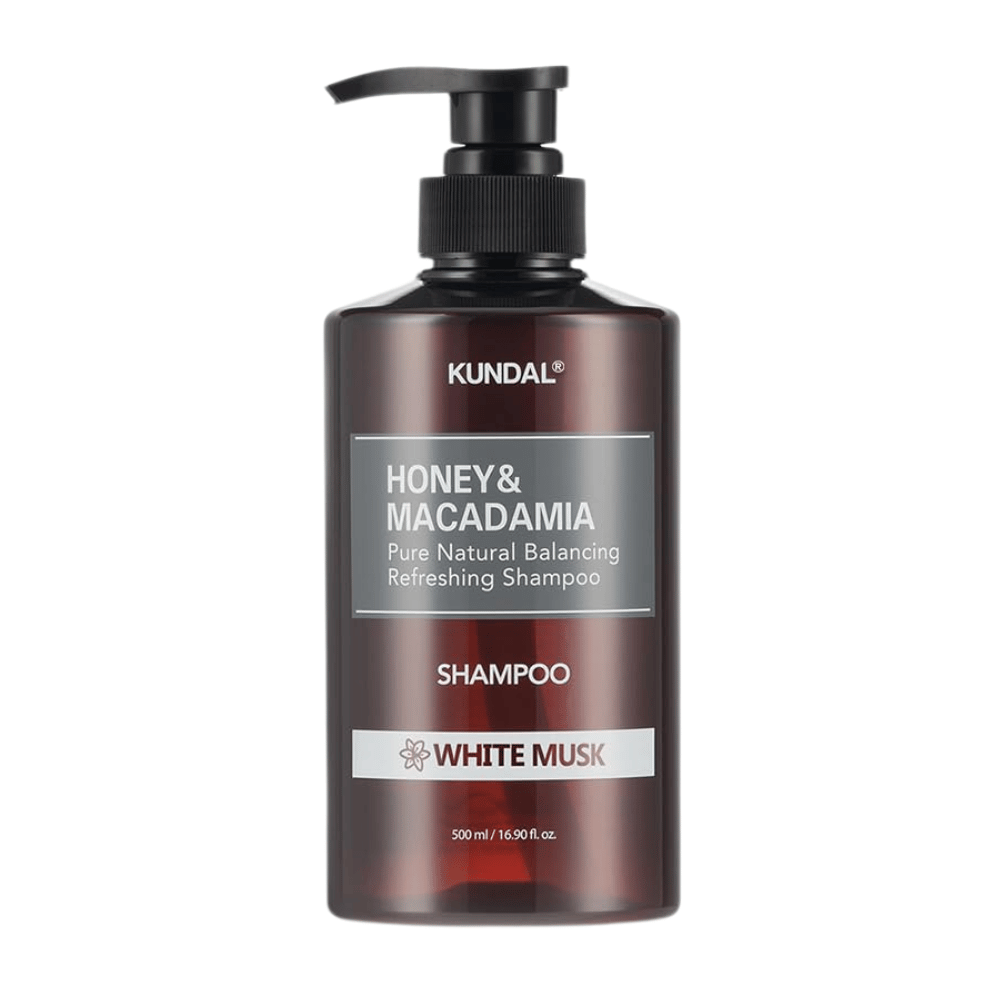 KUNDAL Honey & Macadamia Nature Shampoo White Musk in bottiglia di plastica marrone con pompa, 500 ml.