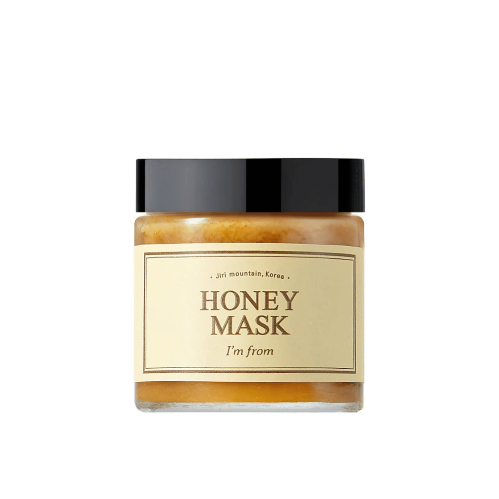  Un barattolo "I'm from Honey Mask", con contenuto naturale di miele, su sfondo bianco.