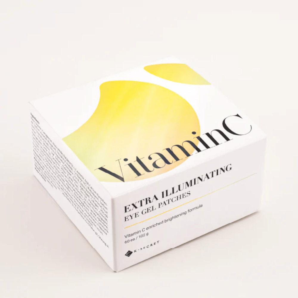 Confezione di K-Secret Extra Illuminating Eye Gel Patches con vitamina C in design bianco e giallo.