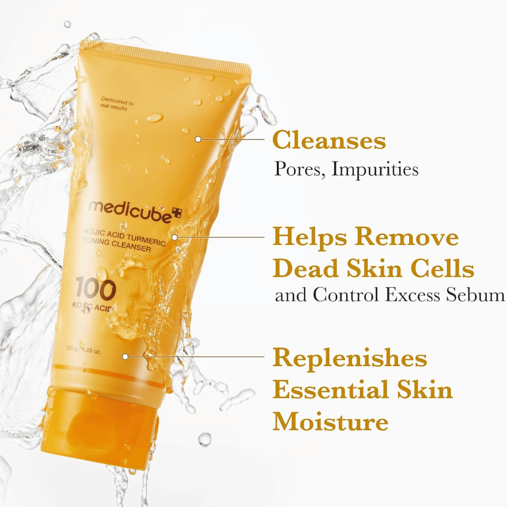 Medicube Kojic Acid Turmeric Toning Cleanser 120 g, detergente viso che rimuove impurità e cellule morte della pelle. Tubetto giallo con schizzi d'acqua.