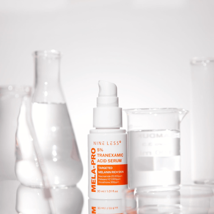 NINE LESS MELA-PRO 5% Tranexamic Acid Serum con acido tranexamico e niacinamide, siero levigante per una pelle più chiara.