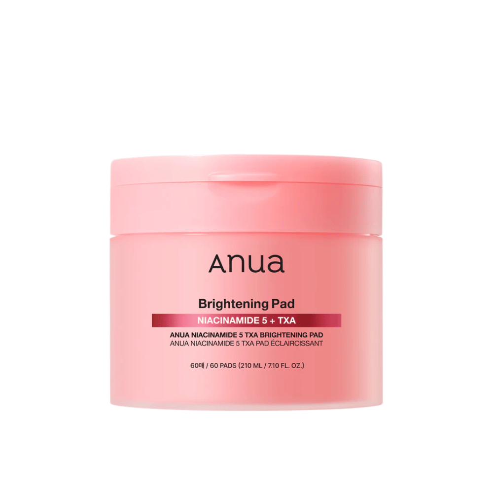 Confezione rosa di Anua Brightening Pad con la scritta "Niacinamide 5 + TXA", contiene 60 pad per la cura della pelle con focus su luminosità e tono della pelle uniforme.
