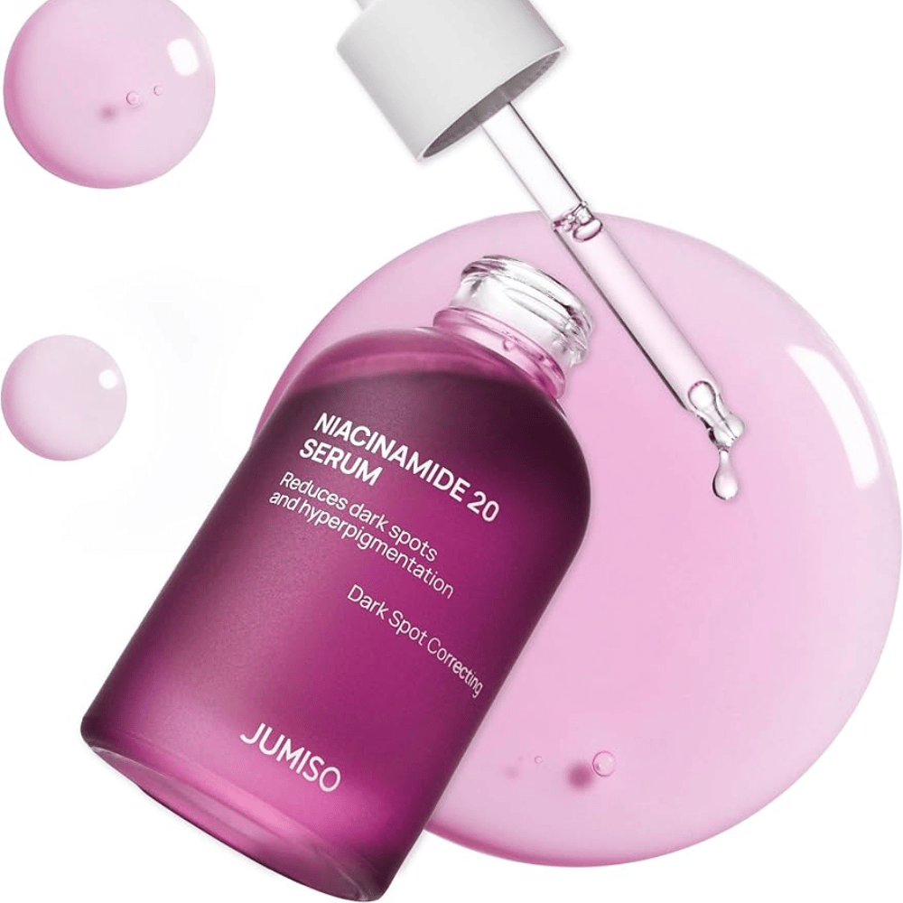 Primo piano di Jumiso Niacinamide 20 Serum – texture rosa chiaro che illumina efficacemente il tono della pelle e riduce l'iperpigmentazione.