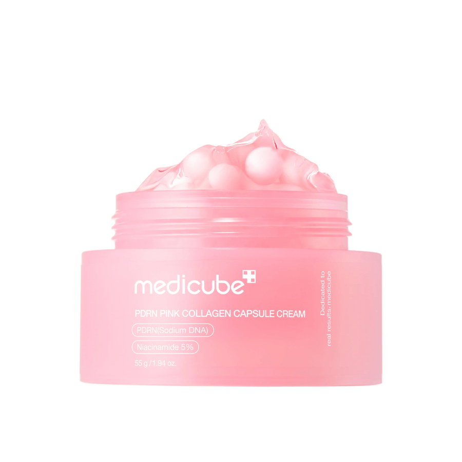 Immagine del prodotto di Medicube PDRN Pink Collagen Capsule Cream con capsule rosa visibili in un barattolo rosa trasparente, progettato per idratare e uniformare il tono della pelle.