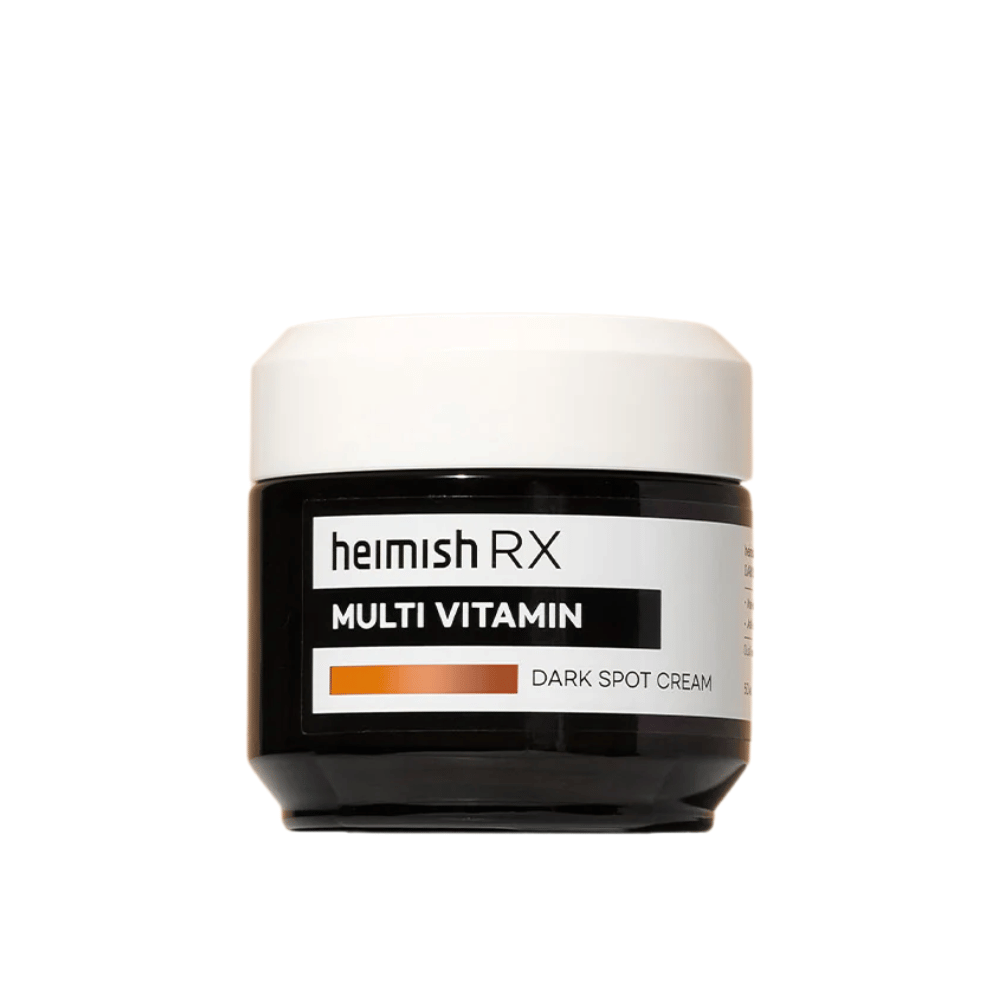 Heimish RX Multi Vitamin Dark Spot Cream in un elegante barattolo nero con coperchio bianco. Una crema viso arricchita con multivitamine, progettata per ridurre le macchie scure e uniformare il tono della pelle.