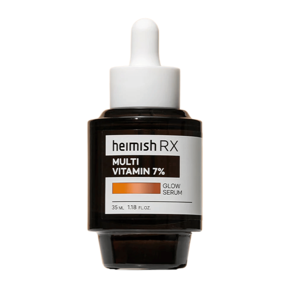 Heimish RX Multi Vitamin 7% Glow Serum in una bottiglia di vetro scuro con tappo a pipetta, progettata per donare luminosità e nutrimento alla pelle.