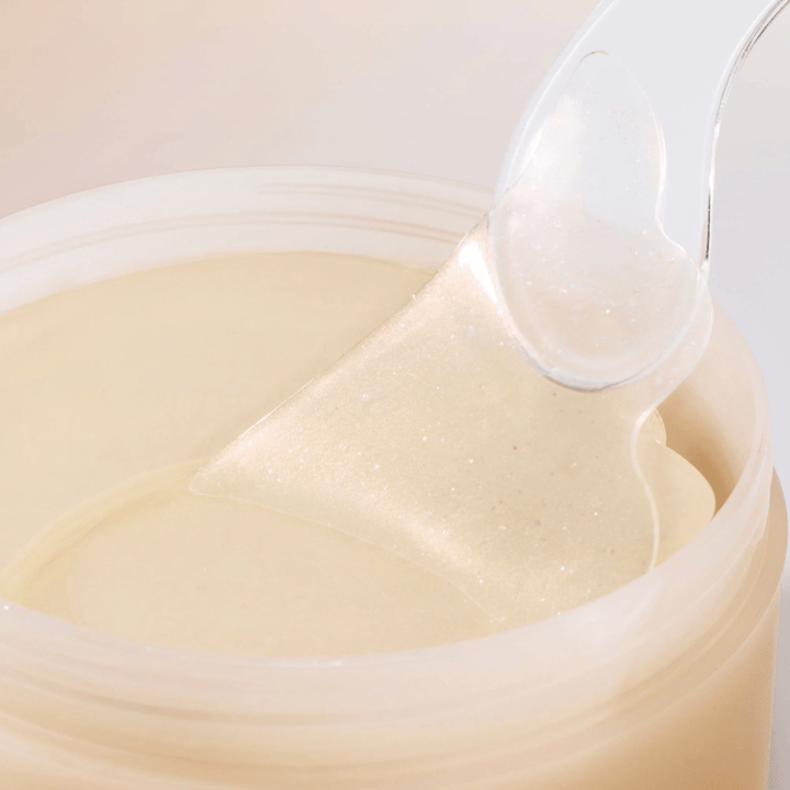 Spatola solleva Beauty of Joseon sotto patch occhi dal barattolo, patch in idrogel con ginseng e retinal per anti-età e cura degli occhi.