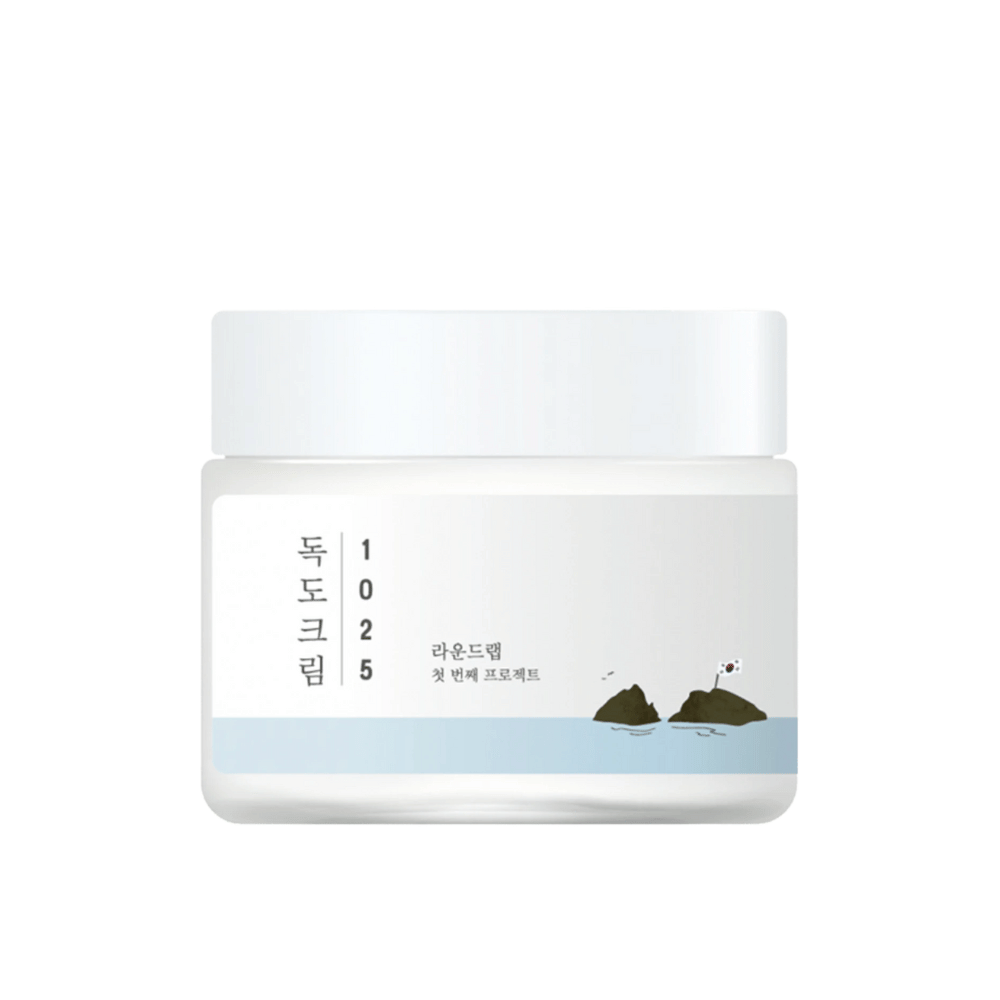 Un barattolo con Round Lab 1025 Dokdo Cream 80ml per idratazione su sfondo bianco.