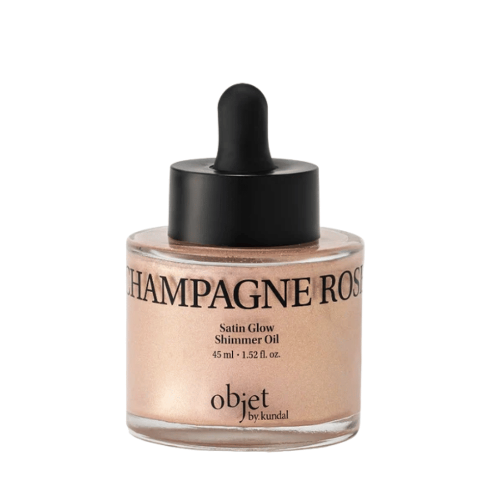 Objet by KUNDAL Satin Glow Shimmer Oil Champagne Rose 45 ml – olio corpo illuminante con una delicata finitura scintillante color oro rosa.