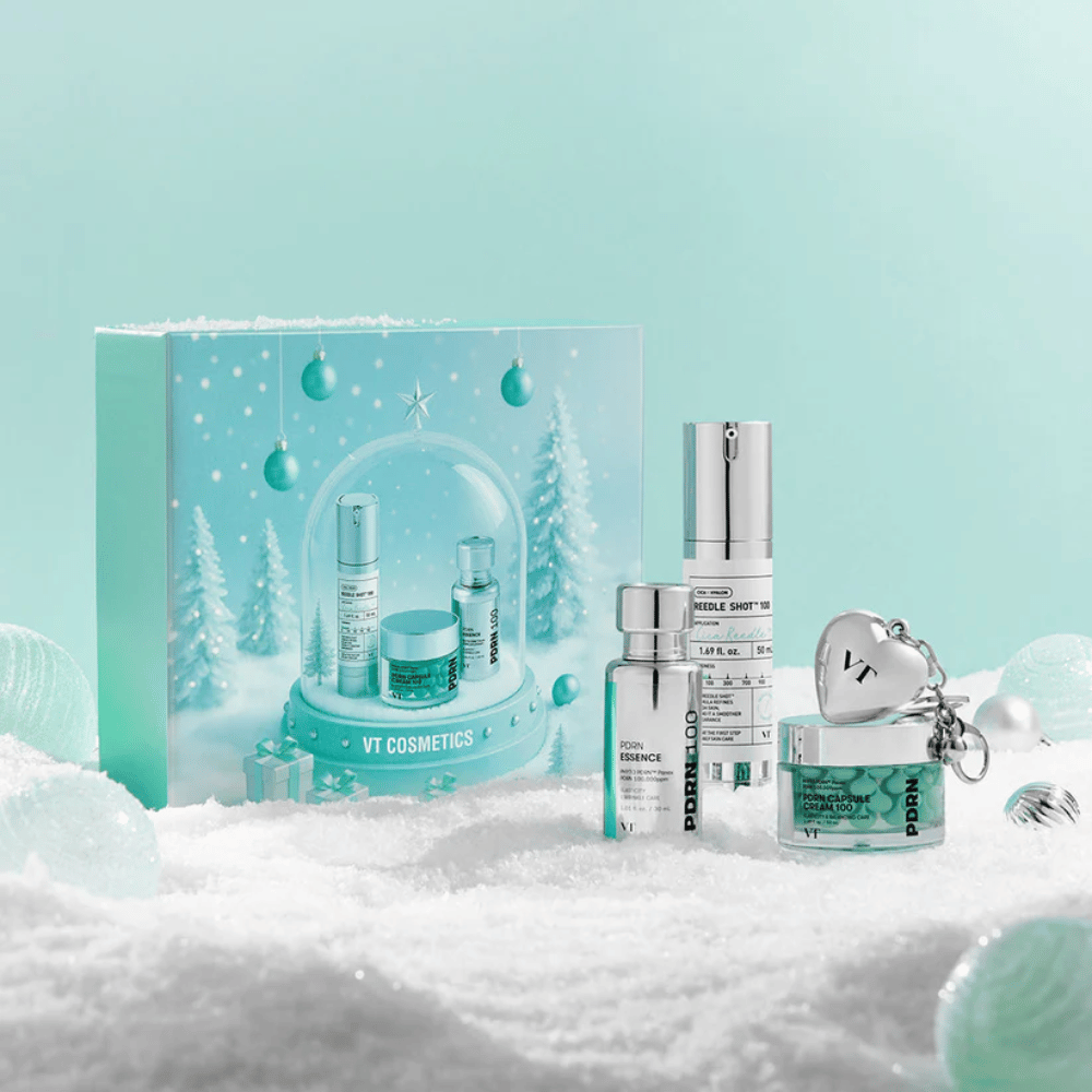 Confezione regalo da VT Cosmetics con prodotti della serie PDRN in design natalizio a globo di neve – perfetto come regalo.
