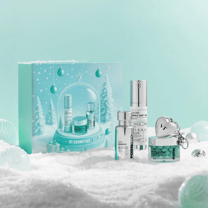 Confezione regalo da VT Cosmetics con prodotti della serie PDRN in design natalizio a globo di neve – perfetto come regalo.