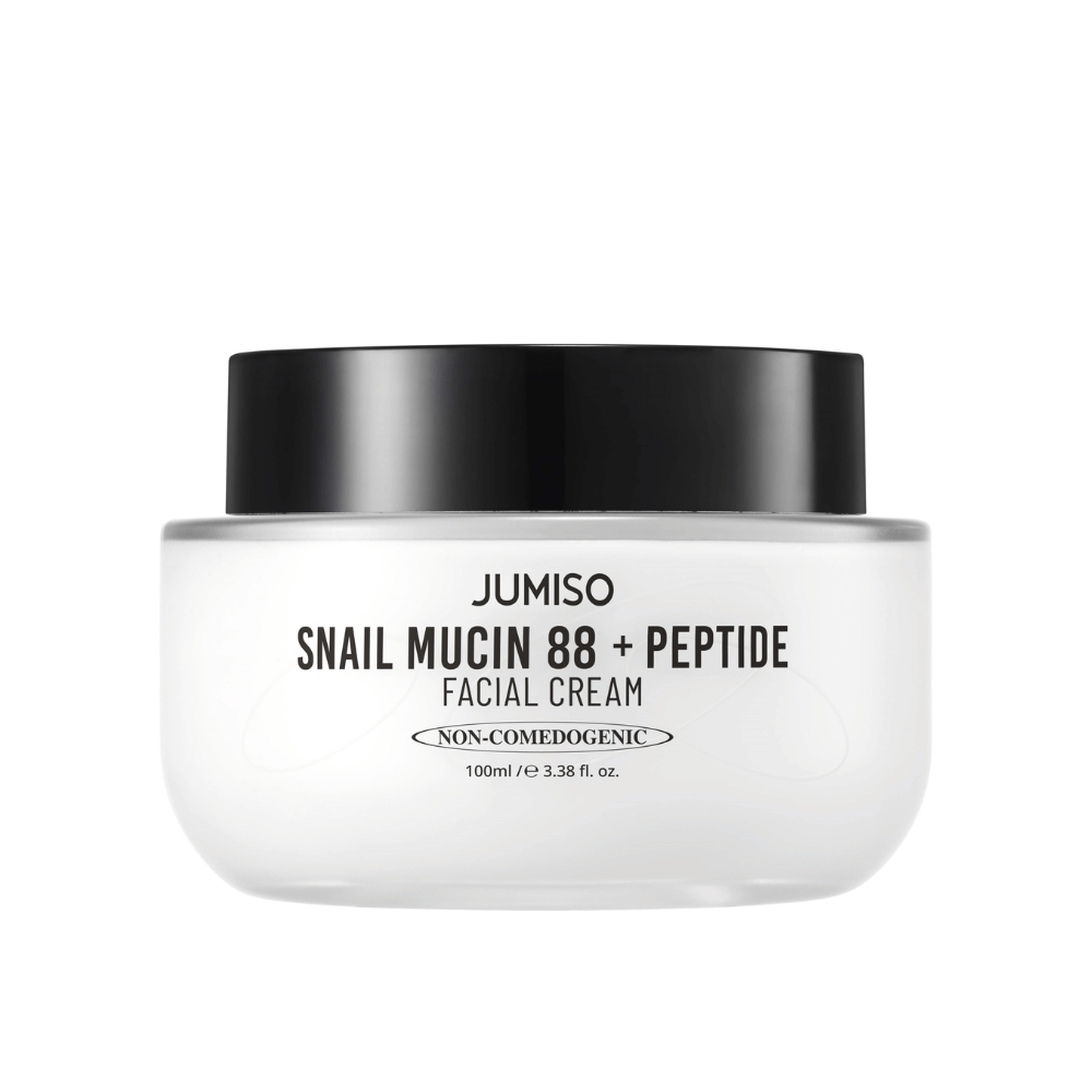 JUMISO Snail Mucin 88 + Peptide Facial Cream in un barattolo bianco con coperchio nero. Crema viso con 88% di bava di lumaca e peptidi per una cura della pelle intensiva e idratazione.