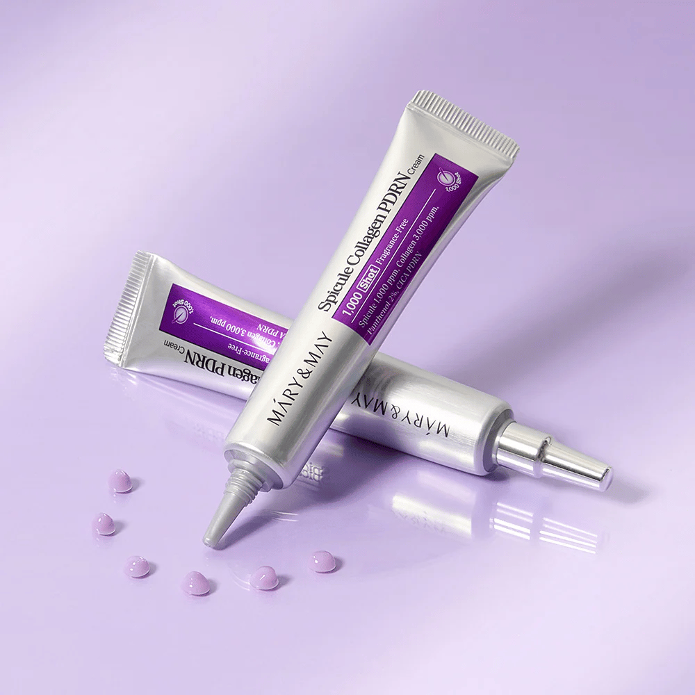 Mary & May Spicule Collagen PDRN Cream in più tubi su sfondo viola, crema viso intensamente rigenerante con tecnologia spicule e collagene.