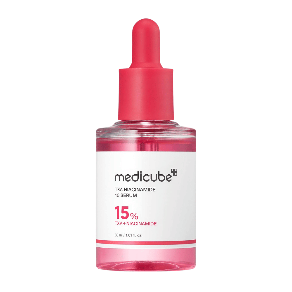 4. Medicube TXA Niacinamide 15 Serum 30 ml – flacone di siero rosa con pipetta su sfondo bianco