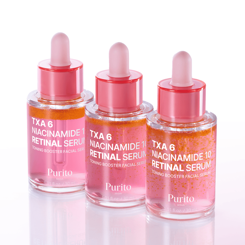 Tre bottiglie di Purito TXA 6 Niacinamide 10 Retinal Serum. Un siero viso illuminante e uniformante con effetto anti-invecchiamento.