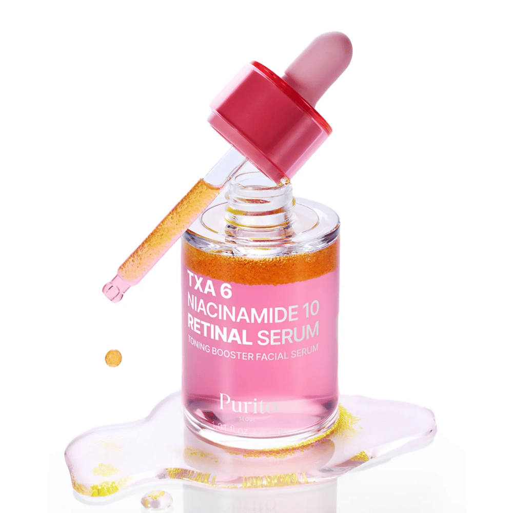 Purito TXA 6 Niacinamide 10 Retinal Serum – siero booster tonificante rosa con pipetta. Combina TXA, niacinamide e retinal per un tono della pelle uniforme.