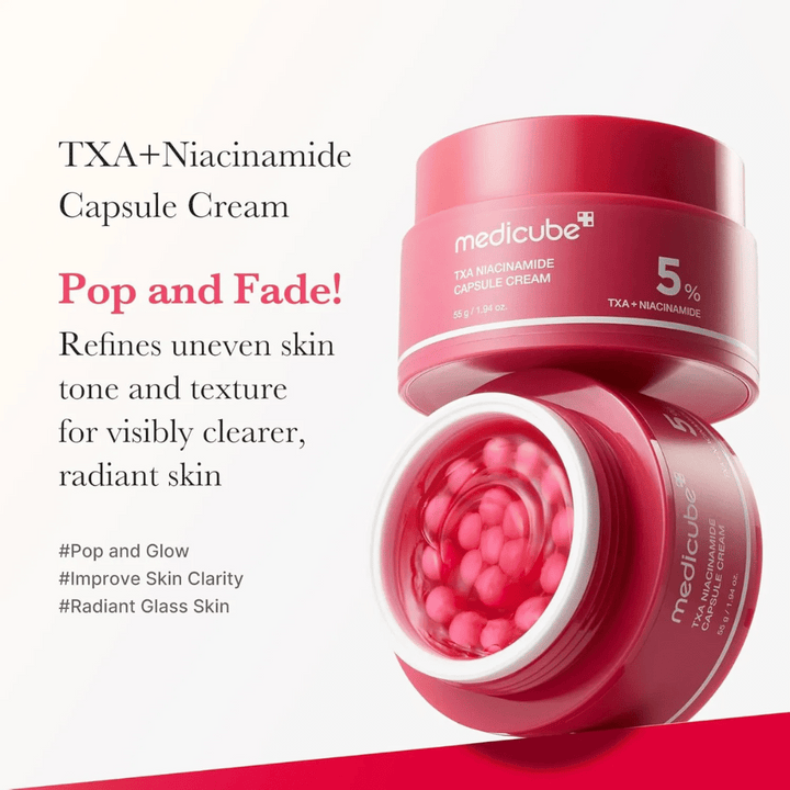 Medicube TXA Niacinamide Capsule Cream con testo su uniformità del tono della pelle e luminosità, mostra un barattolo aperto con capsule rosa e la confezione del prodotto accanto.