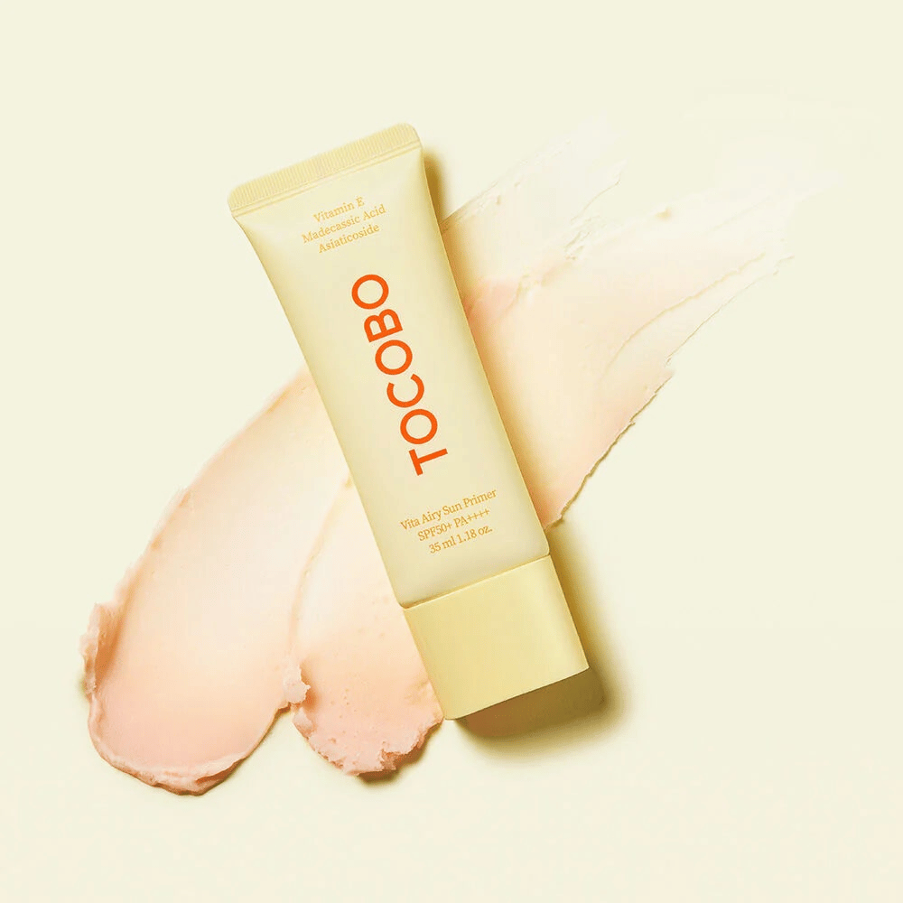 TOCOBO Vita Airy Sun Primer - un primer solare leggero con SPF50+ PA++++ che uniforma il tono della pelle e protegge dai raggi UV, mentre cura con vitamina C e madecassoside.
