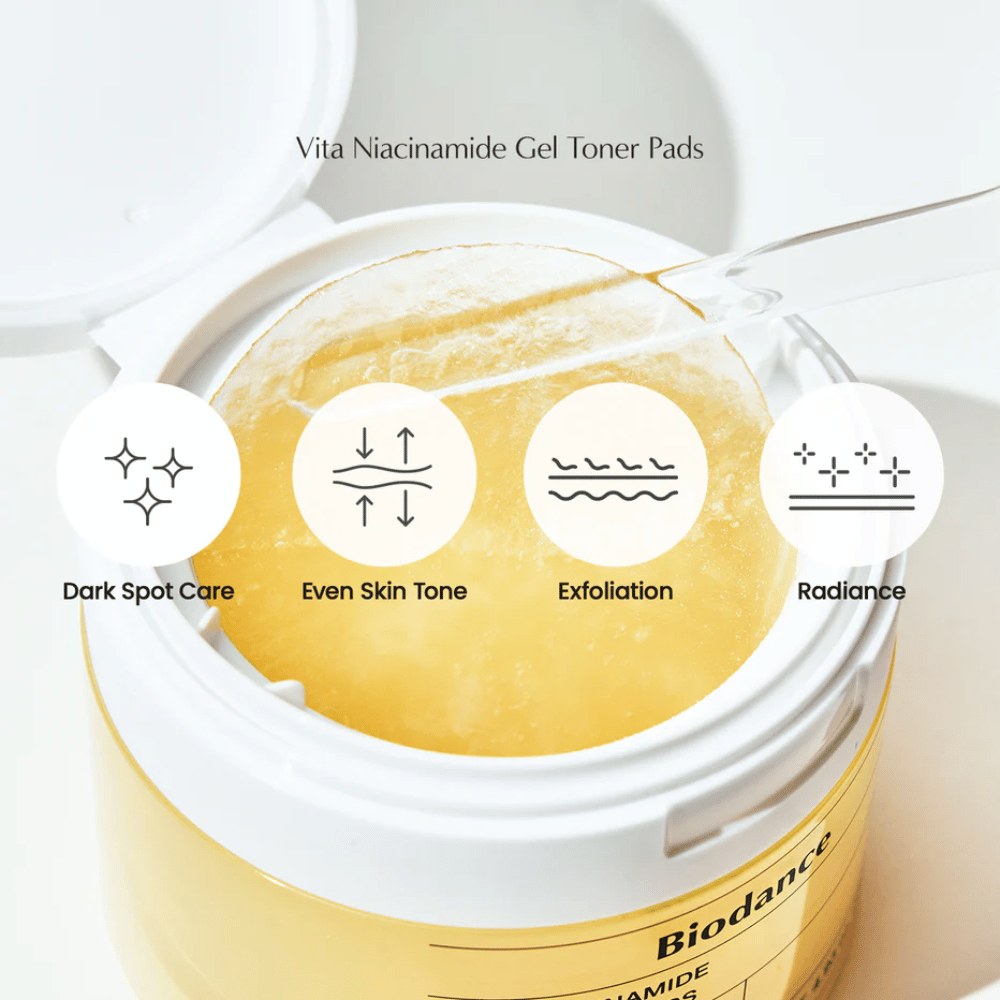 Biodance Vita Niacinamide Gel Toner Pads – exfolierande pads för jämnare hudton, lyster och behandling av mörka fläckar, visade i en öppen burk med pincett.