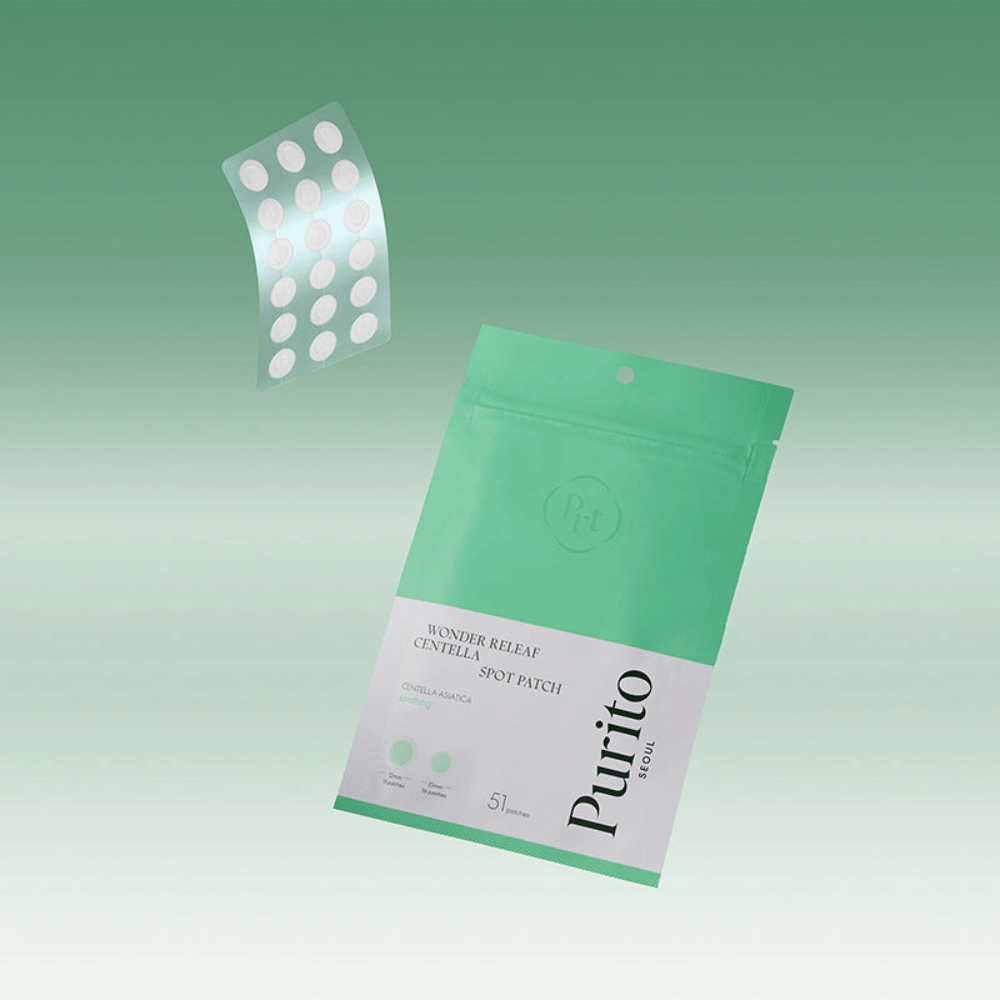 Purito Wonder Releaf Centella Spot Patch con confezione e cerotti trasparenti per acne, trattamento spot lenitivo con centella asiatica per brufoli e pelle irritata.