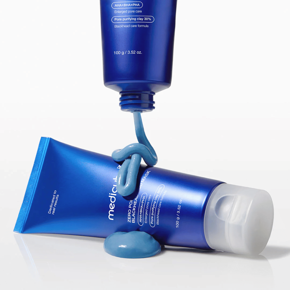 Due tubi di maschera di fango, prodotto blu strutturato all'esterno della confezione.