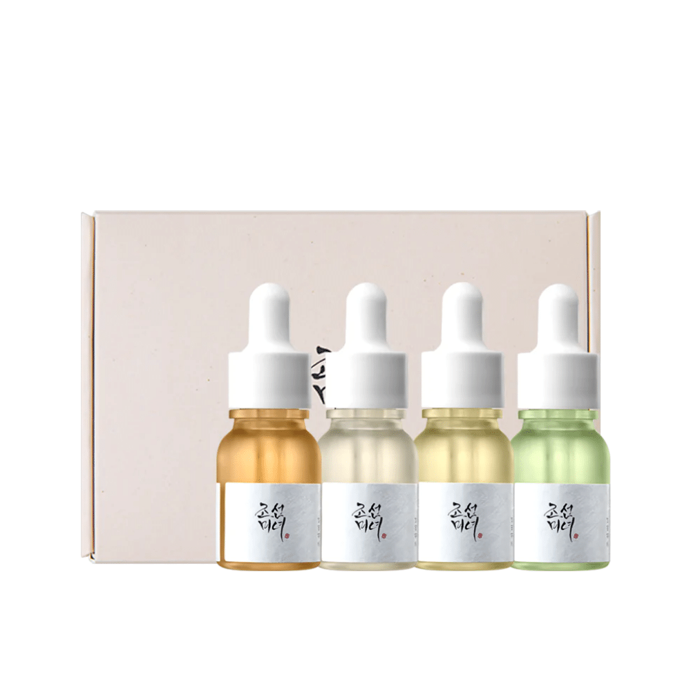 Una scatola con tre bottiglie Hanbang Serum Discovery Kit 4 pz da Beauty of Joseon, ognuna delle quali promuove una luminosità giovanile e riduce le rughe.